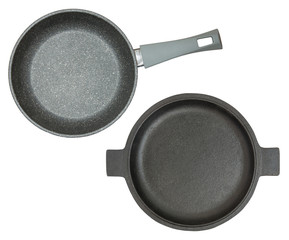 Set of flack iron and gray ceramic frying pan isolated on white background. Top view.