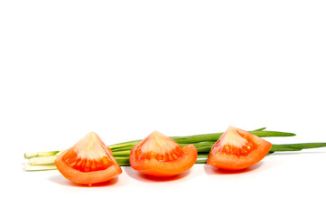 red tomatoes and Young fresh onion isolated on white background