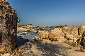 Beautiful beach lagoon bicycle rocks boy