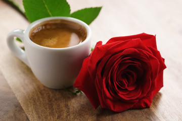 fresh espresso with red rose flower, romantic morning photo