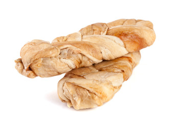 Dried melon in the form of pigtails isolated on white background