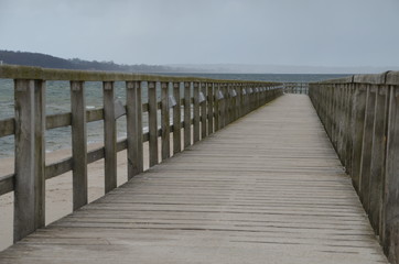 Fototapeta premium Steg in der Brandung