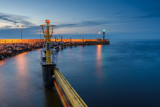 Entrance to the port of Leba in dusk. Poland, Europe. 