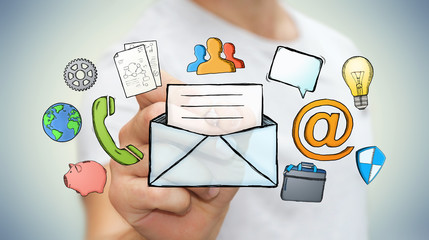 Businessman drawing manuscript contact icon with a pen