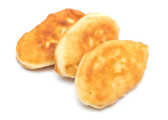 Fresh baked russian pastry pirozhki isolated on white