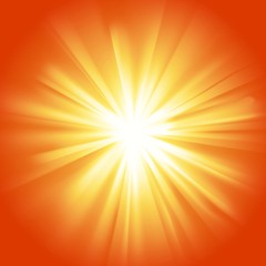 Obraz premium Glowing light yellow orange burst