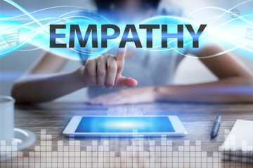 Woman using tablet pc, pressing on virtual screen and selecting empathy.