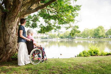 Senior Couple In Wheelchair