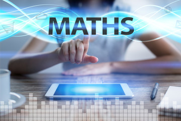 Woman using tablet pc, pressing on virtual screen and selecting maths.