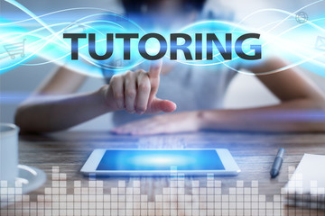 Woman using tablet pc, pressing on virtual screen and selecting tutoring.