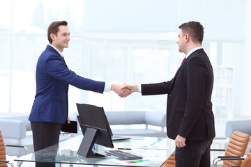 Close up view of business partnership handshake concept.Photo of two businessman handshaking process.Successful deal after great meeting