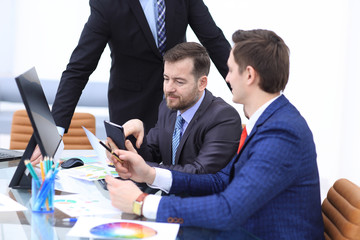 Group of business people busy discussing financial matter during meeting