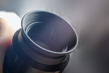 Telescope eyepiece with rubber eyecup, hand hold