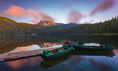 colored clouds in the morning on the lake Black in the national park Durmitor, Montenegro