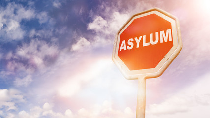 Asylum, text on red traffic sign
