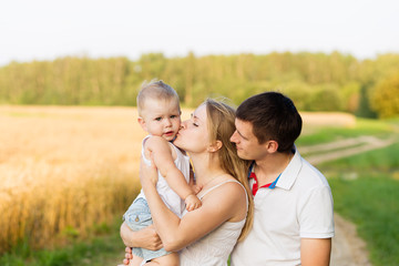 Portrait of beautiful young future parents outdoors