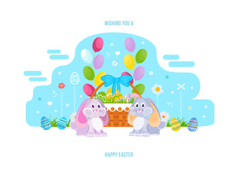 Two lovely festive rabbits, near the basket with Easter eggs.