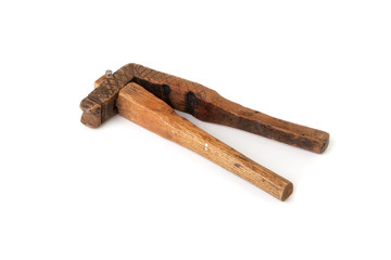 Antique wooden nutcracker isolated on white