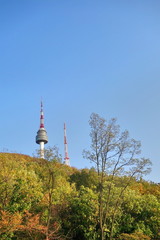 N Seoul Tower, or Namsan Tower, and the blue skies above Seoul in autumn.