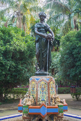 MALAGA, SPAIN - FEBRUARY 07, 2017: A decorated fontain of Nimfa del Cantaro Fountain at the park of Malaga (Andalusia, Spain) on sunny winter day.