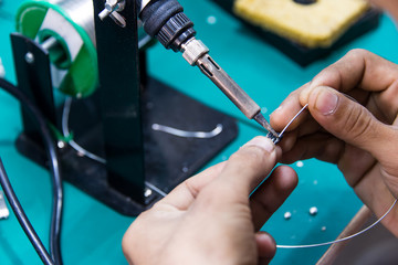 working is soldering cable