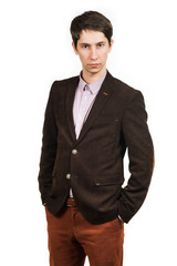 business - happy smiling businessman in a dark brown suit