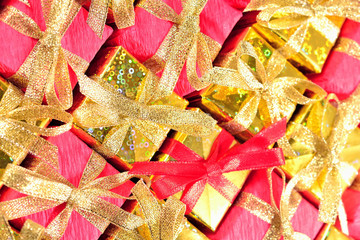 Golden and red gifts close-up