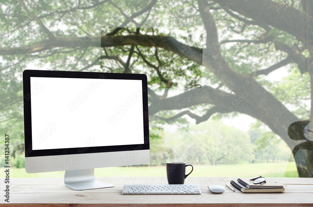 Aufkleber desktop computer on work table and nature background