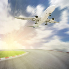 Fototapeta na wymiar Passenger airplane take off from runways against beautiful sky, concept aircraft transport and traveling business industry.