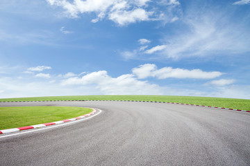 empty asphalt road with green grass on sky background.