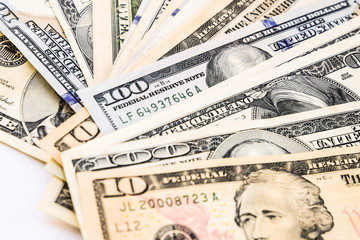 10 and 100 us dollar banknote close up