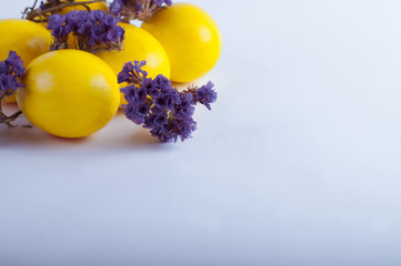 Easter eggs with flowers on a white background