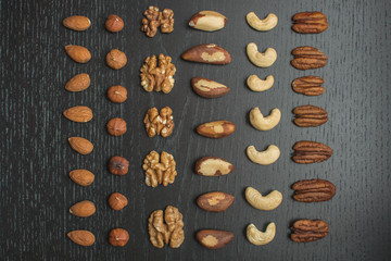nuts laying on a dark table