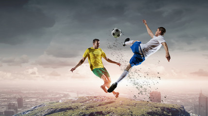 Fototapeta na wymiar Soccer player outdoors . Mixed media