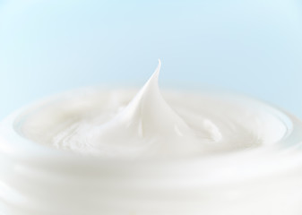 Close-up of cream blue background