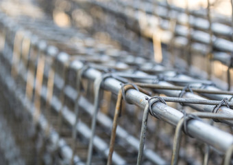 Closeup image of steel wire blurred both image and sharpened wire tie together.