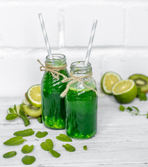 green smoothie on white background
