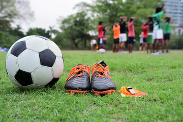 Obraz na płótnie Canvas Soccer equipment in grass field