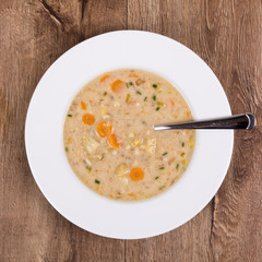 Vegetable soup on a wooden table