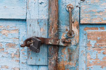 The old door locked with a padlock hanging brackets. Set of backgrounds