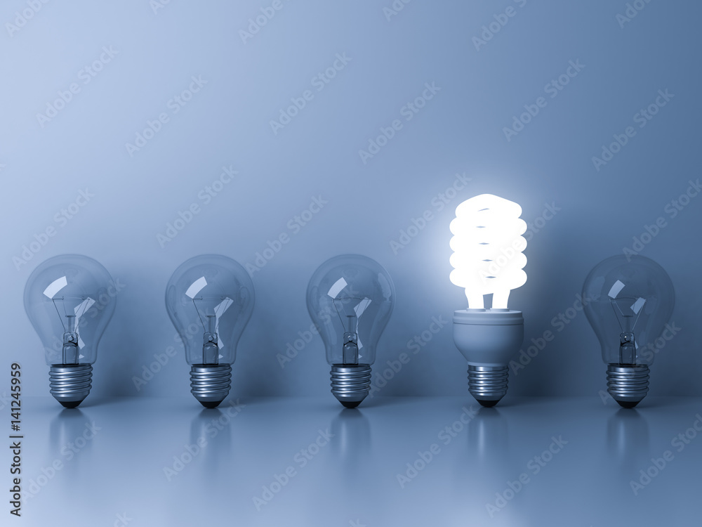 Aufkleber eco energy saving light bulb , one glowing fluorescent lightbulb standing out from unlit incandescen