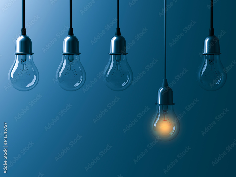 Poster One hanging light bulb glowing different and standing out from unlit incandescent bulbs with reflection on dark cyan background , leadership and different business creative idea concept. 3D rendering.
