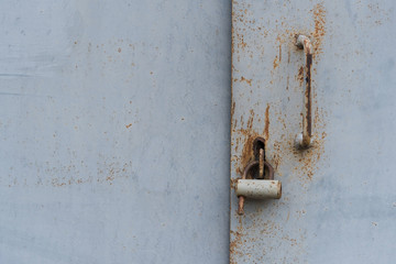 The old door locked with a padlock hanging brackets. Set of backgrounds