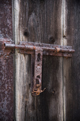 Old wooden door with shutter twisted by wire. Set of backgrounds