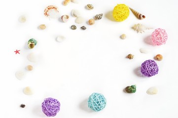 Fototapeta na wymiar Beauty background for blog/ Seashells and colorful rattan wicker balls