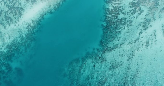 Aerial drone top view video of turquoise water Pileh Lagoon, Phi phi islands, Thailand