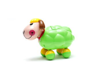 The colorful toy of sheep for kids isolated white background at the studio