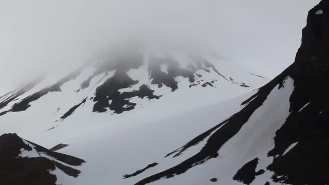 Glacier and permanent snowdrift (annuals) mountainous Champ Island, Franz-Josef Land
