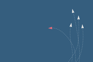 Minimalist stile red airplane changing direction and white ones. New idea, change, trend, courage, creative solution, innovation and unique way concept.
