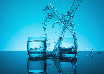 Сreative splashing water in the glass